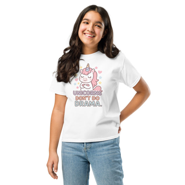 Girls' unicorn white t-shirt featuring "Unicorns don't do drama" wearing by a model